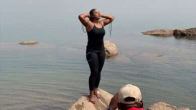 A pose by a tourist at Usuma Dam