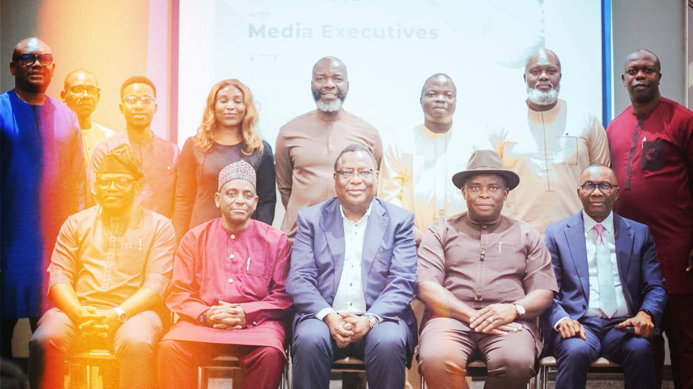 Executive Secretary, NCDMB, Engr. Felix Omatsola Ogbe with the Board Top Management Staff in a group photograph with some members of the Nigerian Association of Energy Correspondents in Lagos.