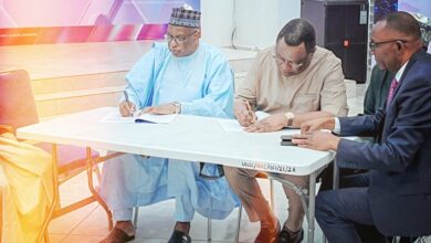 Engr. Felix Omatsola Ogbe (FNSE), Executive Secretary of the Nigerian Content Development and Monitoring Board (NCDMB) seated in the centre, alongside Dr. Hamid Bobboyi, Executive Secretary of UBEC, signing a memorandum of understanding on Thursday 17 October 2024.